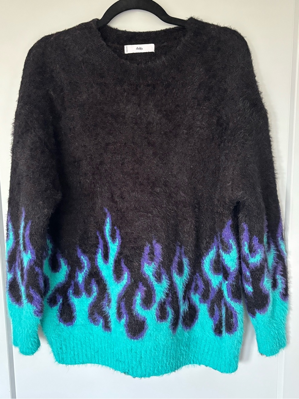 Adika Black Crewneck Oversized Sweater with Teal & Purple Flame Trim